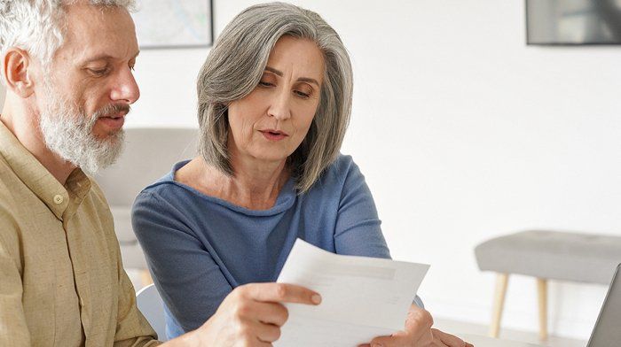 Older-Mature-Couple-Checking-B-419498656-web-1920w.jpg