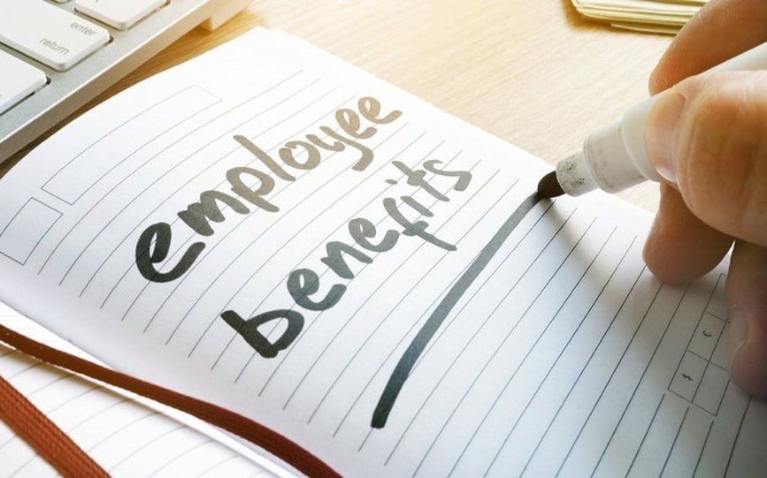 hand-is-writing-employee-benef-239941234-web-1920w.jpg