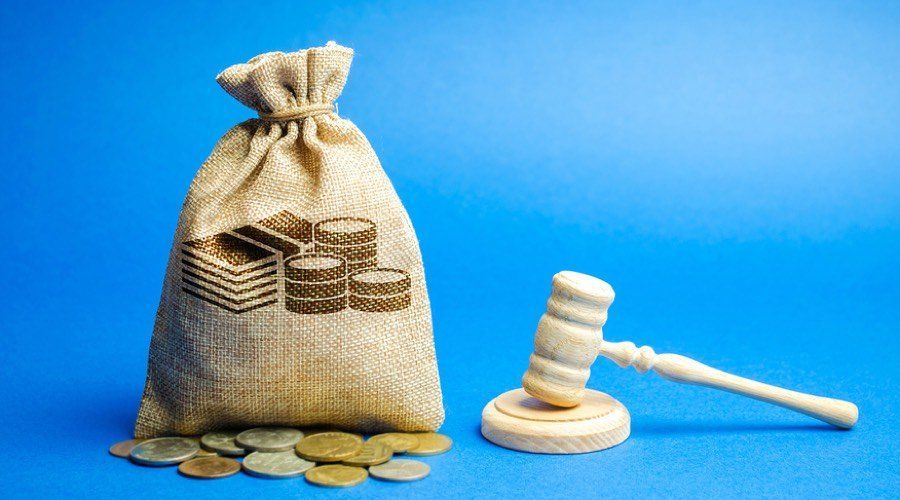 money-bag-and-judge-s-hammer-324561751-web_orig-1920w.jpg