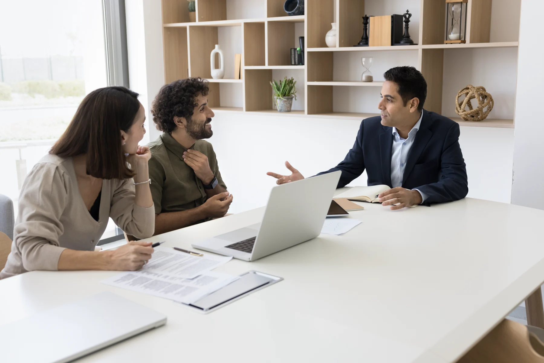 team-meeting-discussing-strategies-for-group-medical-captives-solutions.webp