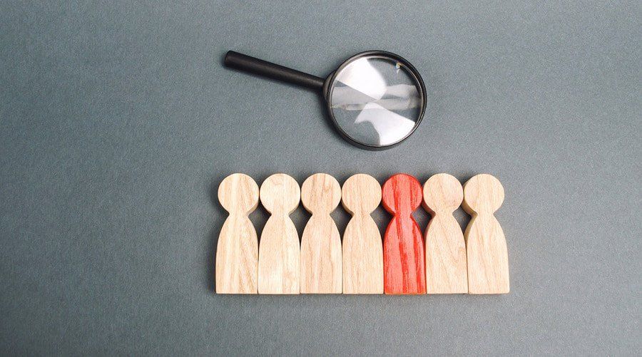 team-of-workers-and-magnifying-296923828_orig-1920w.jpg